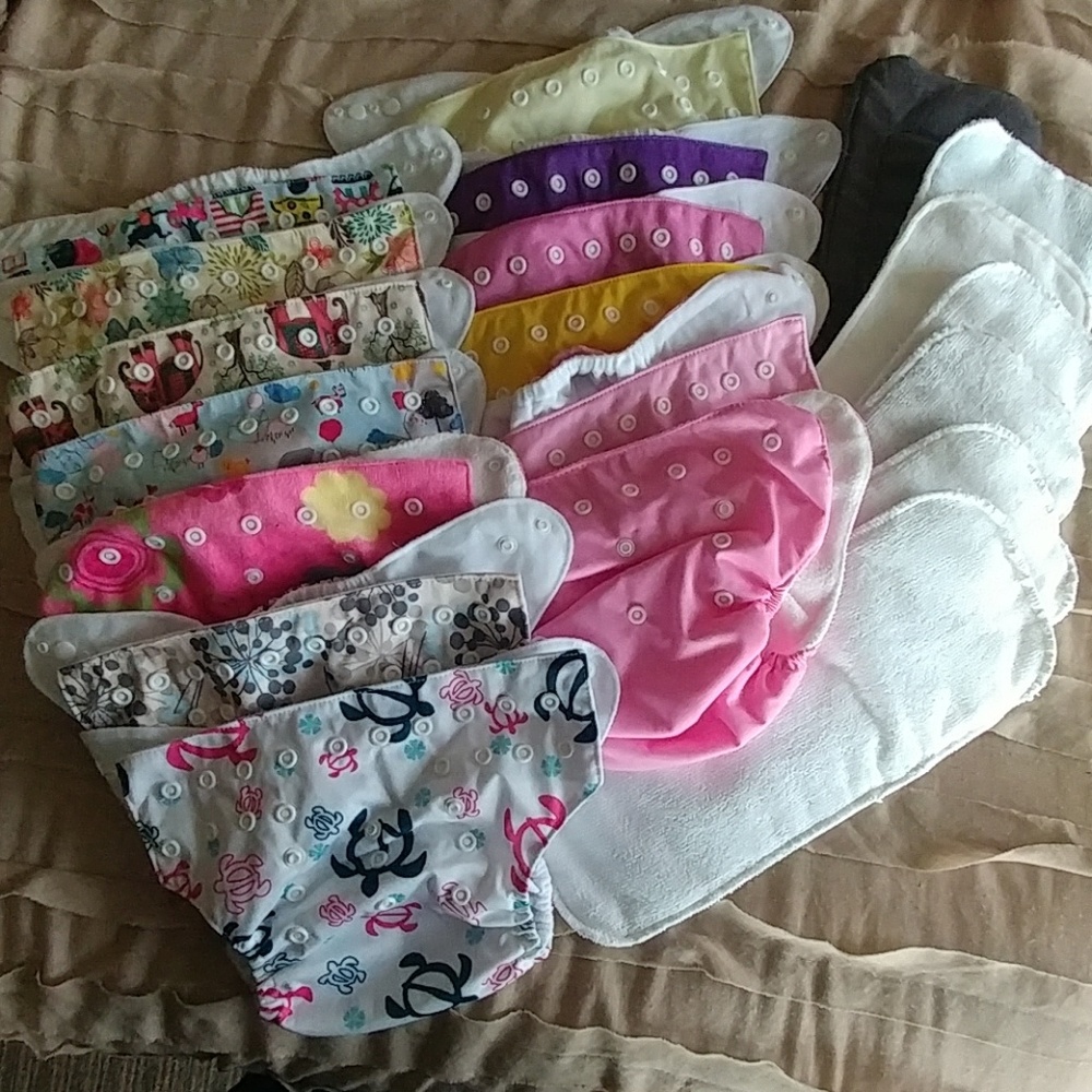 Cloth pocket diapers and inserts